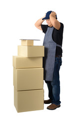 delivery man in Black shirt and apron with stack of boxes isolated