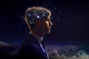 Profile of man with symbol neurons in brain. Thinking like stars, the cosmos inside human