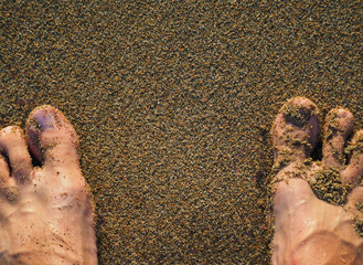 feet in the sand