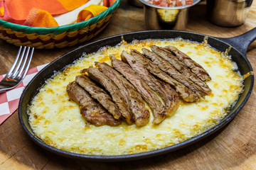 Queso con carne