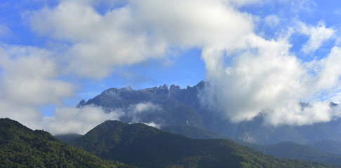 Fototapeta premium Mount Kinabalu during blue sky with cloud formation 