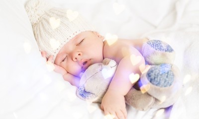 Portrait of  cute  baby boy sleeping on background