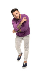 Naklejka premium Handsome young man posing on white background