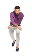Naklejka premium Handsome young man posing on white background