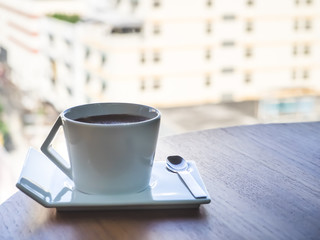 hot coco cup on wood table, hot chocolate milk in the morning.