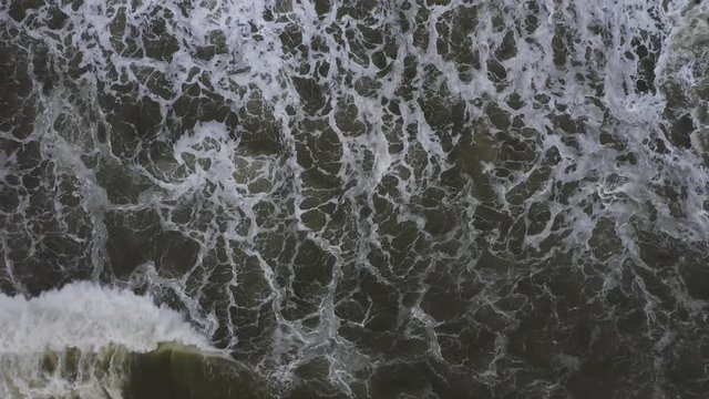 Aerial shot of waves breaking at the coast of Belmar.