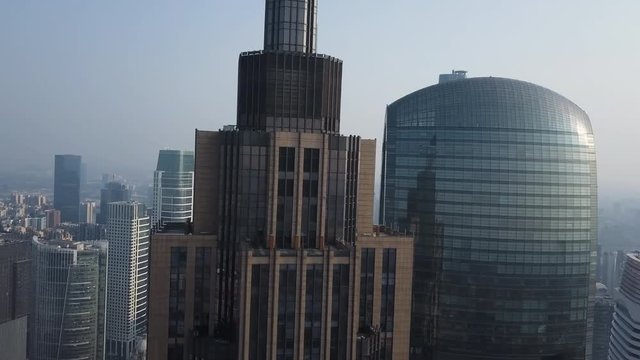 Guangzhou, China. Aerial shot of city downtown central buildings district with Canton tower and pearl river on a sunny day in the afternoon