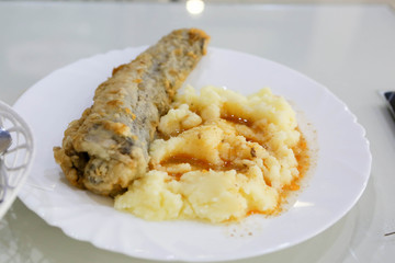 Pollack in batter with mashed potatoes