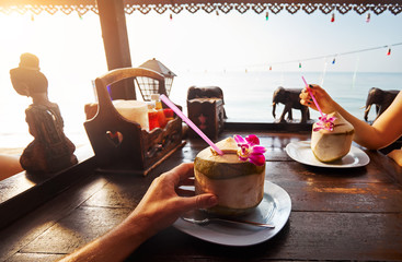 Fresh coconuts at tropical restaurant