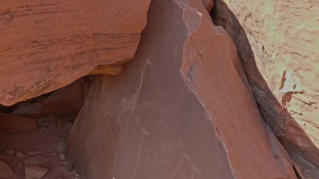 Prehistoric rock art of giraffe engraving at Twyfelfontein, Namibia, WIDE SHOT
