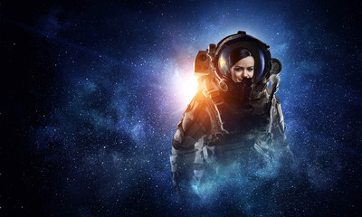 Attractive woman in spacesuit