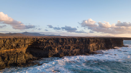 aerial view west coast of Fuerteventura at sunset