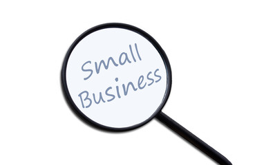 The word small business under a magnifying glass