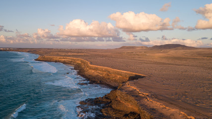aerial view west coast of Fuerteventura at sunset