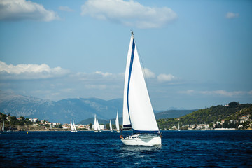 Fototapeta na wymiar Sailing luxury yachts at Aegean Sea. Cruise yachting.