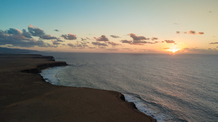 aerial view west coast of Fuerteventura at sunset