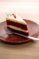 red velvet christmas cake on wooden floor