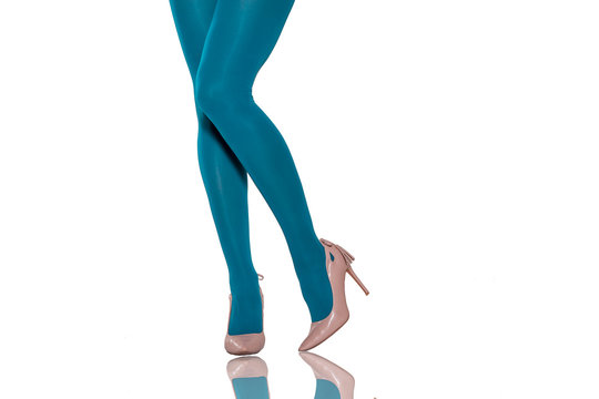 female legs in bright blue tights