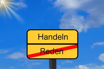 Ein Schild Ende vom Reden und Anfang vom Handeln