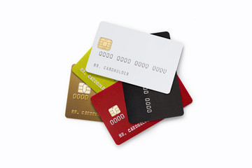 Pile of multicolored credit cards on white background