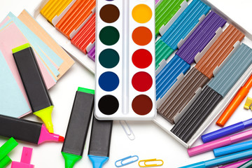 Naklejka premium good preparation for school subjects. School accessories of color plasticine, multi-colored pencils