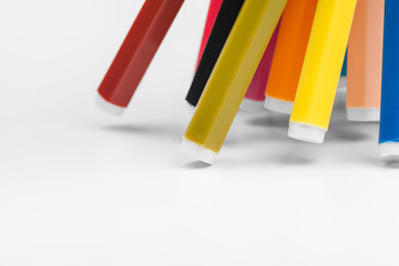 Colored markers isolated on white background