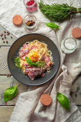 Obraz na płótnie Canvas Pasta Carbonara. Spaghetti with bacon, parsel and parmesan cheese
