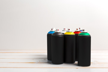 Spray paint cans close up