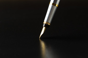 Fountain pen with clipping path on black background