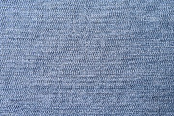 Fototapeta na wymiar Texture of denim or blue jeans background.