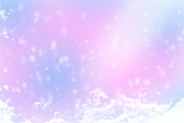 Winter shiny snowflakes blurred background in light blue pink colors. Blurry Christmas holiday background with snow flakes, frost pattern, soft flares of light. Copy space