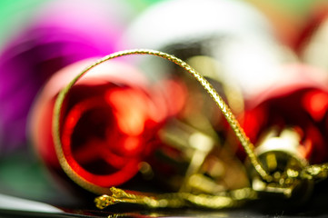Christmas ball on color blurred background. Blurred background.