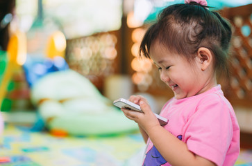 Kids using smart phone : Some research says entertainment media (including TV) be avoided for...