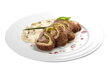 Karlovy Vary roll. A traditional dish of Czech cuisine. Beef roll stuffed with bacon, ham, scrambled eggs and pickled cucumbers.