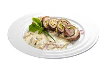 Karlovy Vary roll. A traditional dish of Czech cuisine. Beef roll stuffed with bacon, ham, scrambled eggs and pickled cucumbers.