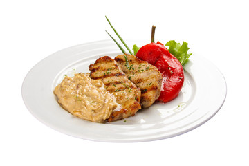 Fried pork in Latvian style. On a white background