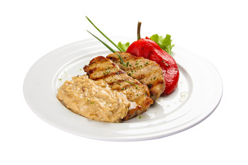 Fried pork in Latvian style. On a white background