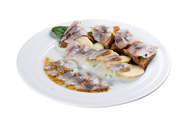 Assorted herring. A traditional Norwegian dish. On a white background