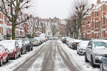 Fototapeta premium London street covered in winter snow are West Hampstead area