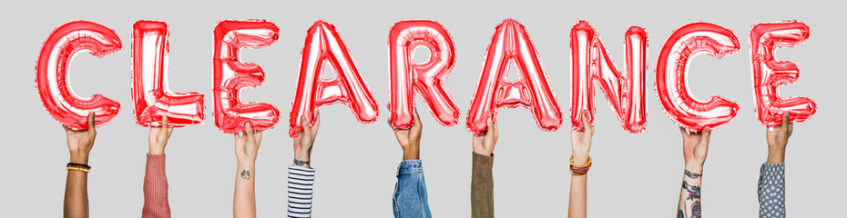 Hands holding clearance word in balloon letters - obrazy, fototapety, plakaty