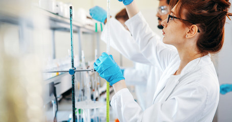 Group of chemistry students working in laboratory