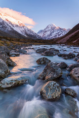 Mount Cook with Hooker River flowing as a foreground in the dawn at Aoraki Mount Cook National Park, Canterbury, New Zealand