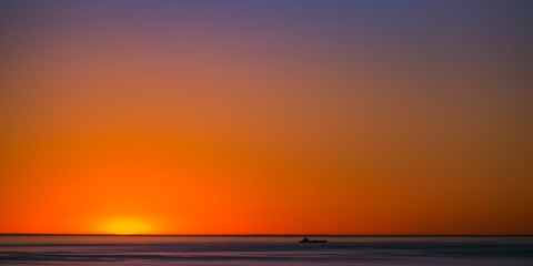 Golden horizon by the San Diego sea at sunset