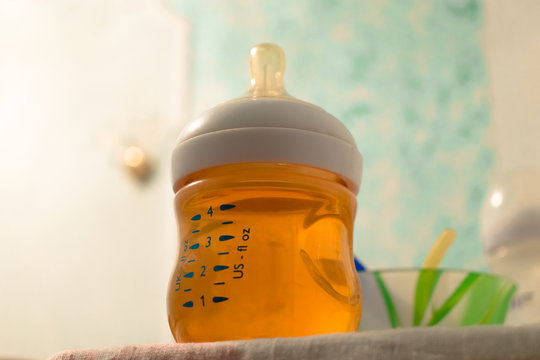 Baby Bottle With Juice. Ready For Baby Feeding