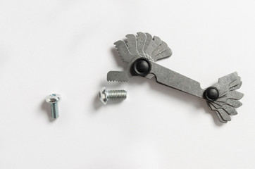 thread gage on white background. Measuring tools. Equipment