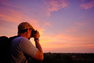 silhouette of man on background of the sky