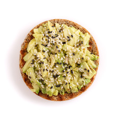 Whole grain bread avocado sandwich seasoned with black and white sesame.