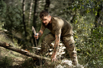 Young woodcutter in the woods