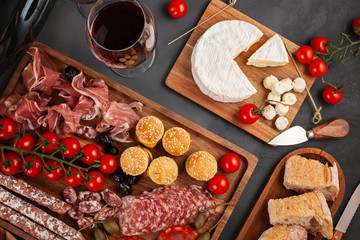 Appetizers table with differents antipasti. Top view, flat lay