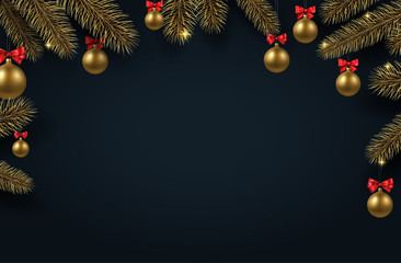 Christmas and New Year background with fir branches and gold Christmas balls.
